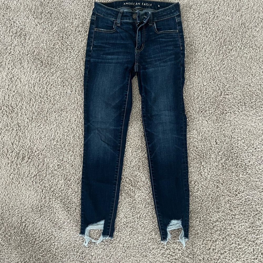 American Eagle Outfitters Blue Skinny Jeans with Distressed Hem